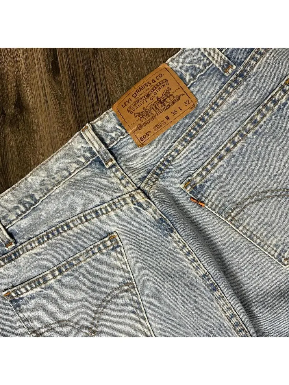 Vintage Levi’s 505 straight fit jeans light washed denim 90s orange tab jeans